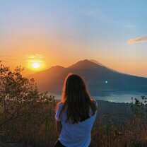 Sunrise trekking of the Mount Batur volcano Picture of me at the top of Mount Batur volcano.