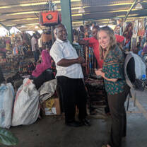 Volunteers at market