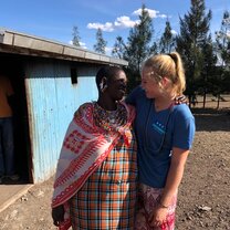 Maasai woman We built and installed a solar panel energy system in this Maasai woman's home! This photo was taken after we finished the installation, and she asked me to take a photo with her.