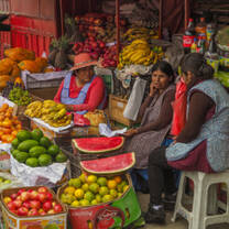 Women at fruit stand