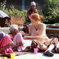 Healthcare volunteer with elderly woman