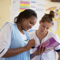 Two nurses work together