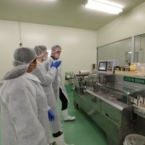 During a tour of the Yamasue production facility learning about the mentaiko extraction process. 