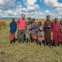 Volunteers and kids group photo
