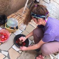 Busy preparing my local food taught by my host mum