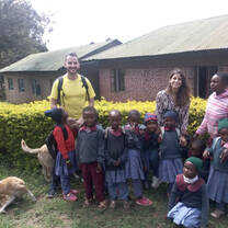 Volunteers and kids group photo