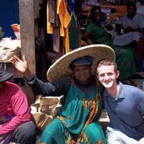 Volunteer and his market women friends