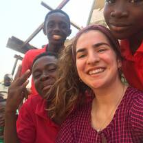 Taken picture with my  students behind the school building 