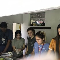 Preparing food to feed the animals 