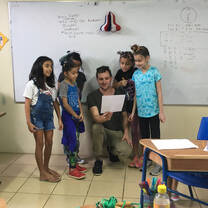 English teacher with young students in Costa rica