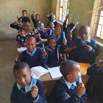 Students happy after teacher given free toothe brush