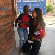 Another picture of an older kid and a baby! 