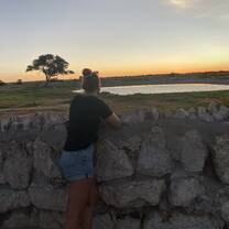 Sunset at a waterhole in Etosha, Namibia