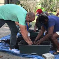 Helping with the earth boxes