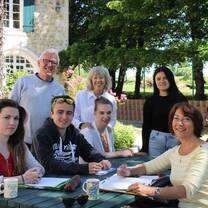 Interns and teachers relaxing at La Giraudiere