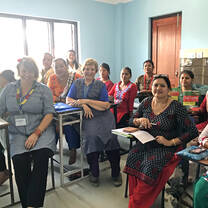The English language class at the Seroptimist Center with Jenny and Fran. 