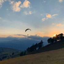 Paragliding with a sunset.