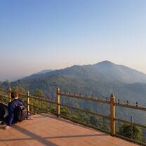 Watch the sunset from the highest peak in the region