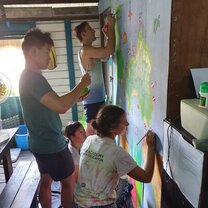 Updating dive map mural in the project house