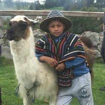 This boy stood outside with his llama to take pictures with people. We stopped here for some delicious Ecuadorian dessert on our way to the biggest market in the country