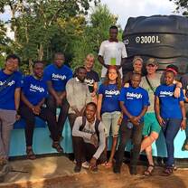 Project team with completed hand-washing station - Muungano - April 2018
