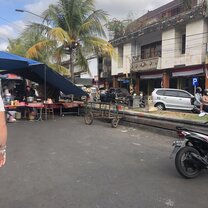 Streets with bikes, tents and people