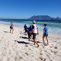 playing soccer on the beach
