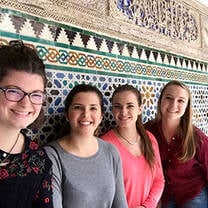 Group in front of wall in Madrid