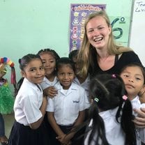 a picture of me with local girls from the school I taught at!