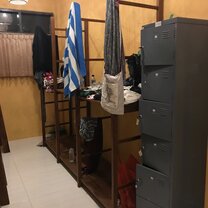 Storage Storage space for belongings. It is an open shelf to place your suitcase on, and there is a lockable cabinet for valuables