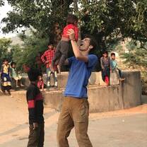 Participant plays with host brother