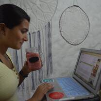 girl studying at desk on laptop