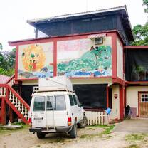 Hillside clinic with mobile vehicle. 