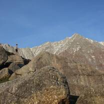 A participant stands high in the Himalayas