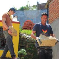 lifting heavy rocks during construction