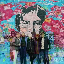 Me and some new friends in front of the Lenon wall in Prague!