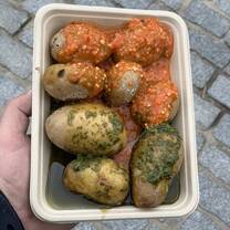 Visit a local market and try traditional dishes from Spain
