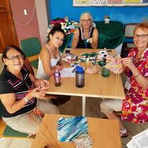 Volunteer with a women's co-op. 