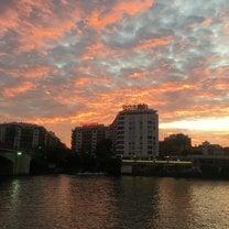 Sunset over the river in Seville, Spain.
