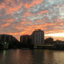 Sunset over the river in Seville, Spain.