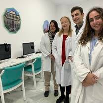 Intern gaining clinical experience with doctors during an international medical internship
