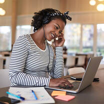 Woman learning on laptop
