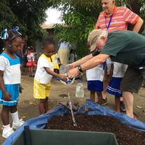 Plant vegetables with families in St. Lucia