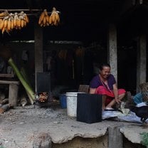This was my last homestay in Thailand and here is a photo of one of my homestay family members preparing dinner for Gracie and I.