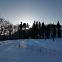 Skiing in Gala Yuzawa Snowy slopes at sunset