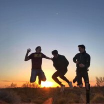 Uluru sunrise A German, a Thai man, and an American go watch the sunrise together