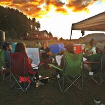 Group meeting at sunset