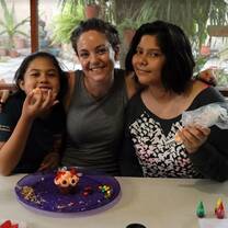Na'atik student with host family