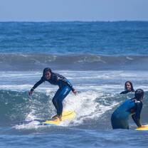 One of our students getting waves at our local surf spot.