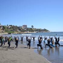 Warming up before getting in the water for a surf session.